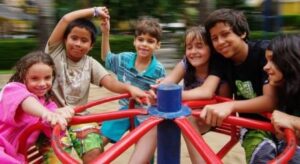 children on roundabout