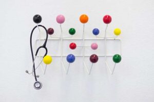 Coat hooks with stethoscope hanging